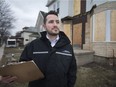 Brandon Callega, a city building bylaw officer, inspects a vacant home in the 400 block of Crawford Avenue, Jan. 24, 2018. Windsor is about to get a whole lot more active in cracking down on the owners of neglected vacant buildings.