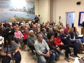 Residents listen Monday night as town council debated a proposal by the Windsor Police Service to provide policing in the Town of Amherstburg. Council approved the proposal.