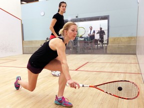 Canadian Squash Championship participants Danielle Letourneau, front, and Sam Cornett hit the court on Feb. 12, 2018, ahead of this weekend's tournament being hosted by Windsor Squash and Fitness.
