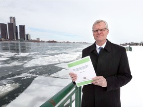 Matthew Child of the International Joint Commission's Great Lakes regional office, shown along the Detroit River Feb. 13, 2018, is a co-author of a new report warning of dire consequences without action to reduce pollutants entering Lake Erie.