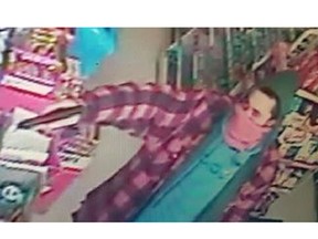 Windsor police have released photos of an armed robber who pointed a gun at a convenience store employee in the 1500 block of Kildare Road on Feb. 25, 2018.