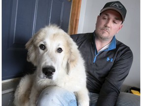 Eric Lalande is saddened after family dog Moose was shot when it wandered near his neighbour's barn February 20, 2018.