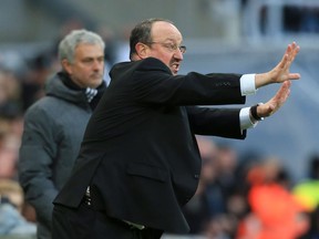 Newcastle United's Spanish manager Rafael Benitez (R) gestures on the touchline during the English Premier League football match between Newcastle United and Manchester United at St James' Park in Newcastle-upon-Tyne, north east England on February 11, 2018.