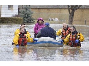 Members of the Chatham-Kent Fire  & Services' dive team arrived at the Siskind and Pegley Court area of Chatham, Ont. on Feb. 24, 2018 to assist residents whose homes were flooded.