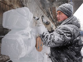 Ice carver Jeff Lao, of Dearborn, Mich., creates a piece at the Colio Estate Wines 18th Annual Festival of Ice on Saturday, Feb. 10, 2018 in Harrow.