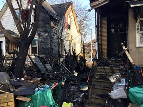 Household property is seen strewn across the backyard of a home at 895 Lincoln Rd. on Feb. 1, 2018, following an overnight fire.