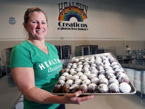 Chris Brecka, owner of Healthy Creations displays her gluten-free paczkis at her Tecumseh, ON. shop on Thursday, February 8, 2018.