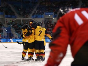 Germany celebrates a Frank Mauer goal against Canada in the Olympic men's hockey semifinals on Feb. 23.