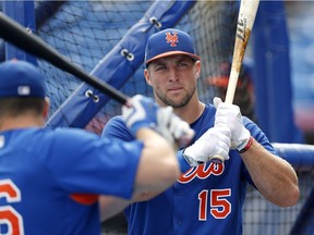 FILE - In this March 13, 2017, file photo, New York Mets' Tim Tebow (15) takes batting practice before a spring training baseball game against the Miami Marlins in Port St. Lucie, Fla. Tebow will be at the Mets spring training as a non-roster invite. The former NFL quarterback and 2007 Heisman Trophy winner batted .226 with eight homers, 52 RBIs and 126 strikeouts in 126 games last year at two levels of Class-A ball.