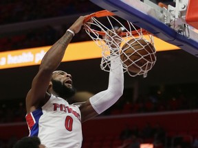 Detroit Pistons center Andre Drummond (0) dunks the ball against the Miami Heat during the first half of an NBA basketball game Saturday, Feb. 3, 2018, in Detroit.