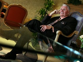 In this March 2, 2009 photo, Art Van Elslander talks to the Free Press in his office in Warren, Mich. Archie "Art" Van Elslander, the founder of Art Van Furniture and a major Detroit-area philanthropist who is credited with saving the city's annual Thanksgiving parade, died Monday, Feb. 12, 2018, his family said. He was 87.