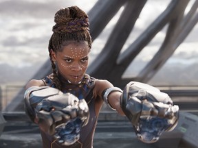 This image released by Disney -Marvel Studios shows Letitia Wright in a scene from "Black Panther." Actress Danai Gurira says the representation of women in the film is important for young girls to see. The film features a number of powerful female leads, including Gurira as the head of a special forces unit, Lupita Nyong'o as a spy, Angela Bassett as the Queen Mother and newcomer Wright as a scientist and inventor. (Matt Kennedy/Disney/Marvel Studios via AP)