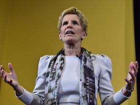 Ontario Premier Kathleen Wynne speaks to media at Queen's Park in Toronto on Jan. 25, 2018.