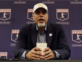 FIEL - In this Feb. 19, 2017, file photo, Tony Clark, executive director of the Major League Players Association, answers questions at a news conference in Phoenix. A proposal collapsed that would have put a runner on second base to start the 10th inning of spring training games, a person familiar with the negotiations told The Associated Press. The person spoke on condition of anonymity Friday because no statements were authorized. Management thinks the union backed off because players were upset Commissioner Rob Manfred described new pace-of-game rules that apply to the regular season as an agreement, the person said.