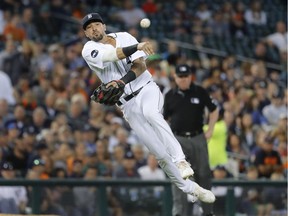 Detroit Tigers third baseman Nicholas Castellanos throws to first base on a grounder by Kansas City Royals' Jorge Bonifacio during the seventh inning of a baseball game in Detroit on June 27, 2017.