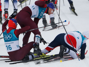 An early crash couldn’t keep Norway's Simen Hegstad Krueger from gold in the skiathlon on Sunday, even though he broke a pole and had to pass 67 people.