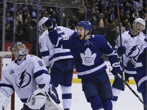 Toronto Maple Leafs right wing Connor Brown (28) celebrates after his teammate Toronto Maple Leafs left wing James van Riemsdyk (25) scores the fourth goal of the game in Toronto on Feb. 12, 2018. The Toronto Maple Leafs hosted the Tampa Bay Lightning at the Air Canada Centre.