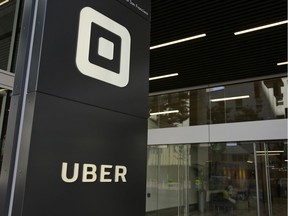 FILE - This June 21, 2017, file photo shows the building that houses the headquarters of Uber, in San Francisco. Ride-hailing giant Uber's full-year net loss widened to $4.5 billion in 2017 as the company endured a tumultuous year that included multiple scandals, a lawsuit alleging the theft of trade secrets and the replacement of its CEO.