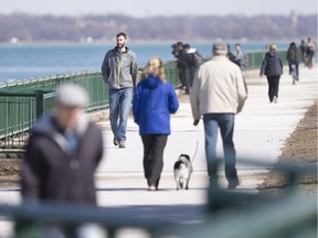 People flock to the waterfront to enjoy the unseasonably warm weather, Tuesday, February 27, 2018.
