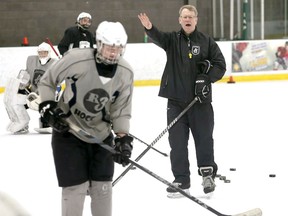 Head coach Robb Serviss, right, conducts drills with A21 Sports Academy team members at WFCU Centre.  (NICK BRANCACCIO/Windsor Star)  See story.