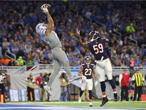 Detroit Lions tight end Eric Ebron #85 catches a touchdown pass over Chicago Bears inside linebacker Danny Trevathan #59 during the third quarter at Ford Field on Dec. 16, 2017, in Detroit.
