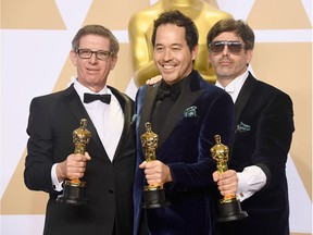 Set decorator Jeffrey A. Melvin, production designer Paul Denham Austerberry, and set decorator Shane Vieau, winners of the Best Production Design award for 'The Shape of Water,' pose in the press room during the 90th Annual Academy Awards at Hollywood & Highland Center on March 4, 2018 in Hollywood, California.