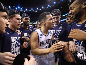 Jalen Brunson of the Villanova Wildcats celebrates with teammates after defeating the Texas Tech Red Raiders 71-59 in the 2018 NCAA Men's Basketball Tournament East Regional to advance to the 2018 Final Four at TD Garden on March 25, 2018 in Boston, Massachusetts.