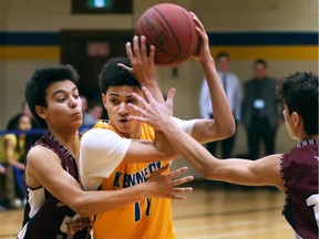 Marquise Lara Caston, centre, and the Kennedy Clippers were eliminated from medal contention with a quarter-final loss on Tuesday at the OFSAA boys' AAA basketball championship.