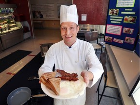 Mitch Stanton, a chef at Hotel-Dieu Grace Healthcare, displays a freshly cooked breakfast plate on Friday, March 23, 2018. The hospital has a new program that encourages rehab patients to eat together.