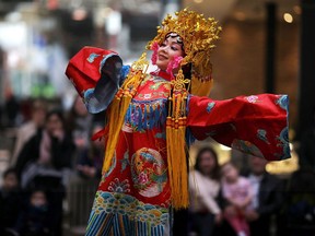 Ivy Xu performs in the Chinese costume parade during the Chinese New Year celebration at Devonshire Mall in Windsor on March 18, 2018.