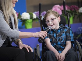 AM800's Karo Ro speaks with Damien Fitzpatrick during the 2018 Easter Seals Telethon at Central Park Athletics on Sunday, March 25, 2018.