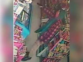 A security camera image from a convenience store in the 1500 block of Kildare Road where a gunpoint robbery took place on Feb. 25, 2018.