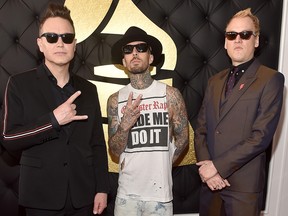 Mark Poppus, Travis Barker and Matt Skiba of the band Blink-182 attend The 59th GRAMMY Awards at STAPLES Center on February 12, 2017 in Los Angeles, California. (Photo by Alberto E. Rodriguez/Getty Images for NARAS)