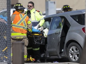 A person was loaded into an ambulance and taken to hospital after a vehicle was involved in a collision with a transport truck at the intersection of McDougall Avenue and Eugenie Street on March 16, 2018.