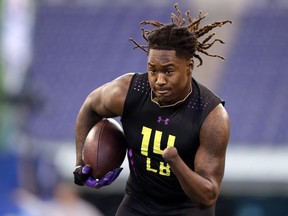 Central Florida linebacker Shaq Griffin runs a drill at the NFL football scouting combine in Indianapolis on March 4, 2018.