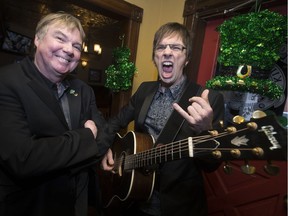 Kevin Shannon, left, and Ted Lamont of the band Paddy Whacked, are pictured March 15, 2018, at O'Maggio's Kildare House, one of their performance stops on St. Patrick's Day on Saturday.