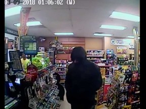 A security camera image of a robber at the Mac's convenience store at 4675 Seminole St. on March 9, 2018.