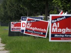 Election signs for the 2014 municipal election in Windsor are pictured on Askin Ave., north of Northwood St., on Monday, Sept. 15, 2014.