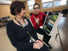 The City of Windsor plans to ban smoking in Windsor Housing residences for new tenants. Brenda Schmidt, left, a tenant at Ouellette Manor, gets tips from Amber Vigneux, a nursing student working with the local health unit at a March 1, 2018, workshop held to help people quit smoking.