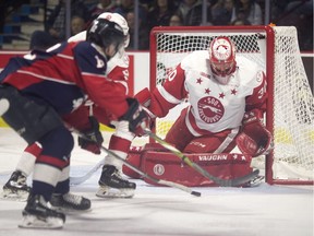 Windsor's Spitfires forward William Sirman looks to get a shot at Sault Ste. Marie goaltender Tyler Johnson, during Thursday's game at the WFCU Centre.