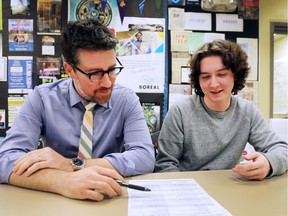 Tecumseh Vista Academy guidance counsellor Matt Biggley, left, is shown March 9, 2018, with Grade 11 student Owen Van Vlack, an Ontario pupil who took the rare step of switching from the applied to the high school academic stream.