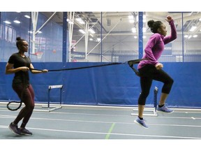 Hurdler Nia Holmes, left, and Jermeka Castello, are port of University of Windsor Lancers women's track and field team aiming high for this weekend's U Sports championships in Windsor.