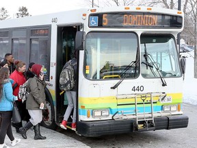 Transit Windsor is hoping to get a share of nearly $22 billion in mostly new transit and environmentally friendly infrastructure funding announced by the two senior governments on March 14, 2018. Here, students board the bus at St. Clair College's main campus on Feb. 13, 2018.