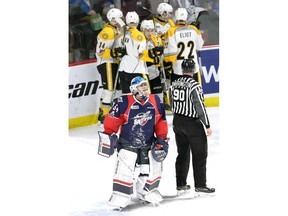 Windsor Spitfires goaltender Mikey DiPietro glances to the scoreboard after Sarnia Sting scored their second goal of the first period in Sunday's Game 6 at the WFCU Centre. (NICK BRANCACCIO/Windsor Star).