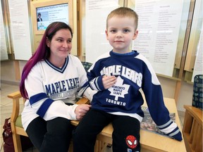 Marie Domingue, left, and her son, Ethan, 5, take part in jersey day for the Humboldt Broncos hockey team and their families.  Ethan, a leukemia patient, proudly displays his Maple Leafs jersey as he and his mother visited Regional Hospital's Met Campus.