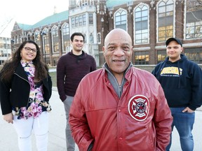 Ron Jones, former city councillor and retired District Chief of Windsor Fire Department, is preparing to graduate from the University of Windsor with a bachelor's degree in political science.  In the photo, Jones visits the University of Windsor's main campus with grandchildren Ashley Duval, left, Jordan Casey and Darius Rovere on Friday March 16, 2018.   His grandchildren will be graduating with their own university degrees around the same time this spring.