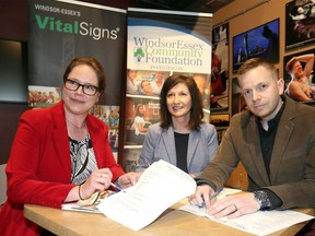 Windsor Essex Community Foundation program coordinator Anna Maruska, centre, with Lisa Kolody, Windsor Essex Community Foundation executive director, and Adam Patterson are seen during the launch of the 2018 Vital Signs survey at the Windsor Star's News Cafe on April 24, 2018.