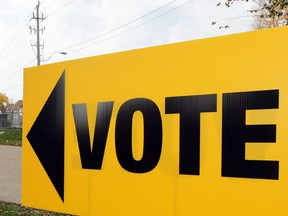 A sign indicates a voting station for the Oct. 27, 2014, municipal election.