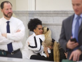 Bill Cosby accusers (L-R) Lili Bernard and Caroline Heldman react after the guilty on all counts verdict was delivered in the sexual assault retrial at the Montgomery County Courthouse on April 26, 2018 in Norristown, Pennsylvania.  Cosby was found guilty on all accounts after a former Temple University employee alleges that the entertainer drugged and molested her in 2004 at his home in suburban Philadelphia.  More than 40 women have accused the 80 year old entertainer of sexual assault.