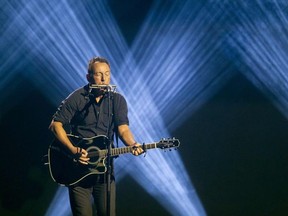 (FILES) In this file photo taken on September 30, 2017 Bruce Springsteen performs during the closing ceremony of the Invictus Games 2017 at Air Canada Centre in Toronto. Springsteen on March 21, 2017, extended a run on Broadway until December as the rock legend's unusually intimate shows keep fetching top dollar. It marks the third extension by Springsteen, who started the performances in October in the 960-seat Walter Kerr Theatre.
